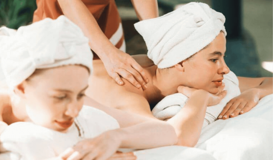 Professional massage therapists in a serene NYC spa setting