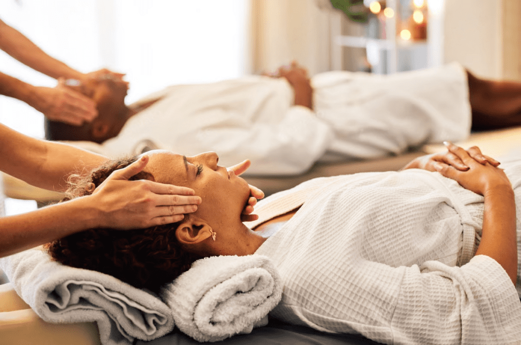 Couples enjoying a relaxing side-by-side Thai massage at Union Thai Spa NYC