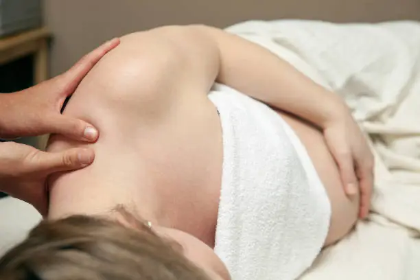Gentle prenatal massage experience at Union Spa NYC, reducing stress and tension during pregnancy